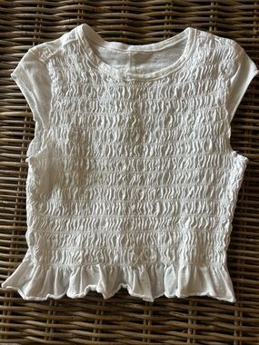 Women’s White Smocked Cap Sleeve Top with Ruffle Hem